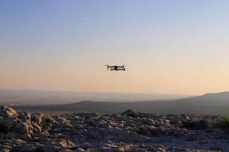 Drone in flight at sunset